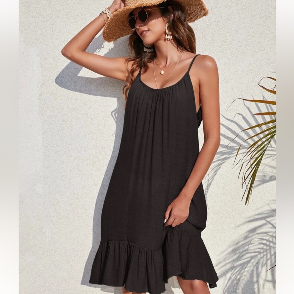 Cute ruffle black cover up dress! Fits S/M/L